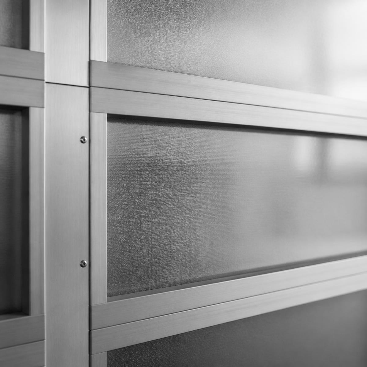Close-up of a modern aluminium and frosted glass garage door panel